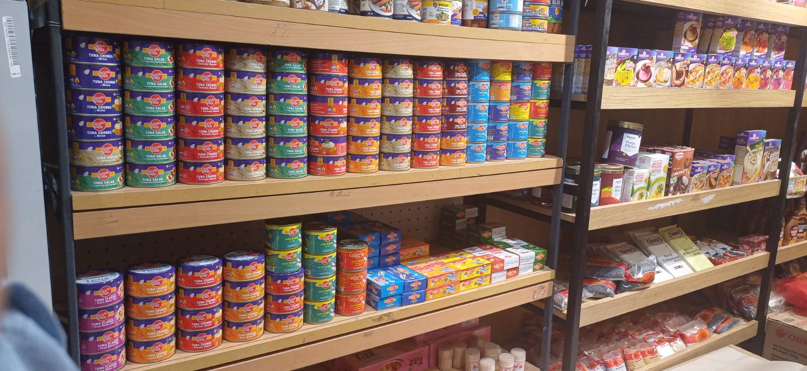 Golden Prize canned seafood range occupying a premium retail display
