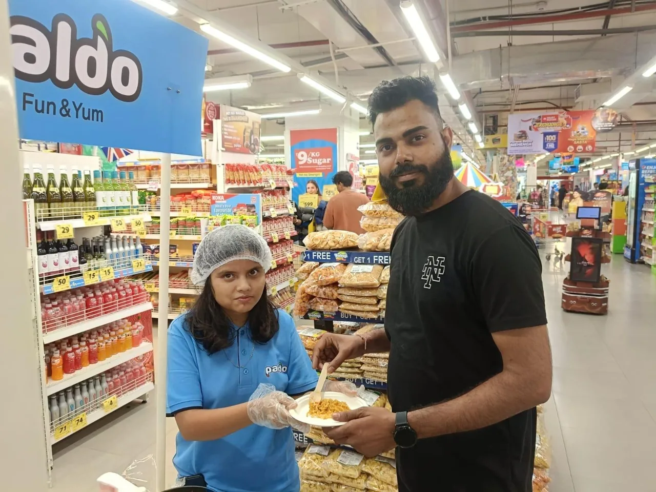 Paldo in-store product sampling with an Indian shopper